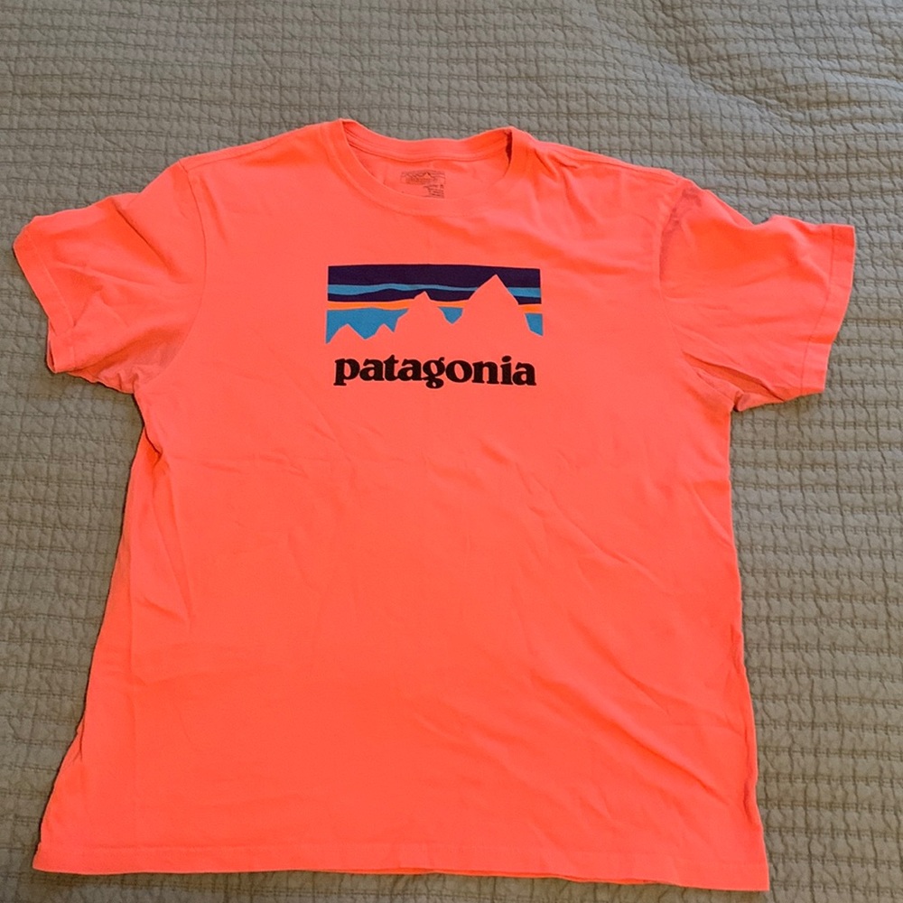Men’s Patagonia tshirt in a bright coral color